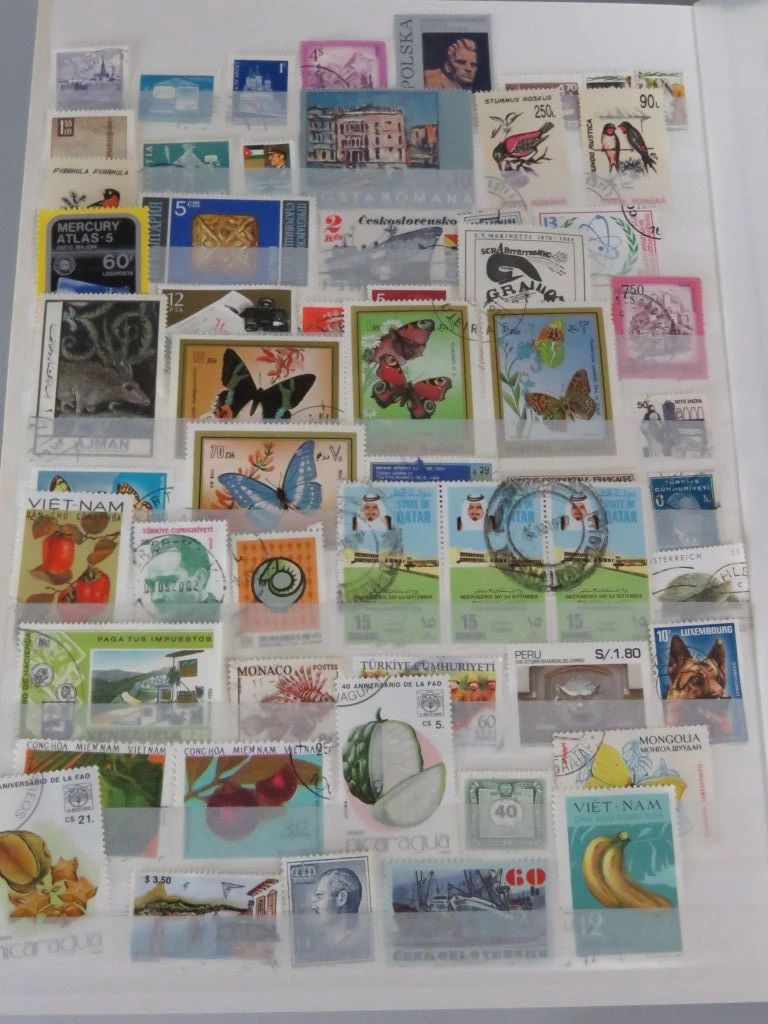 Postzegelverzameling in album met Belgische en vele andere postzegels