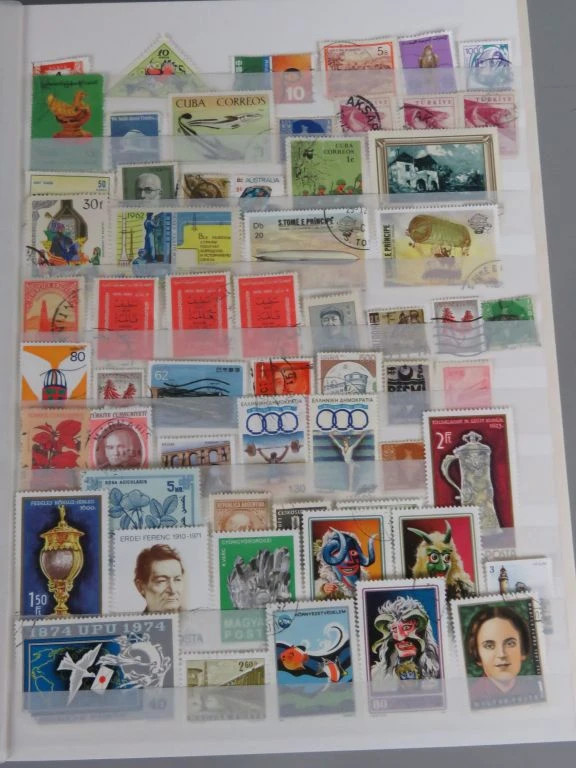 Postzegelverzameling in album met Belgische en vele andere postzegels