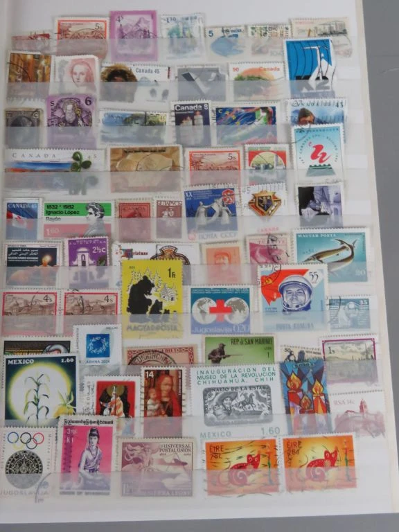 Postzegelverzameling in album met Belgische en vele andere postzegels
