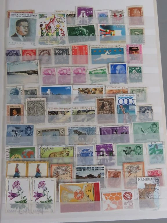Postzegelverzameling in album met Belgische en vele andere postzegels