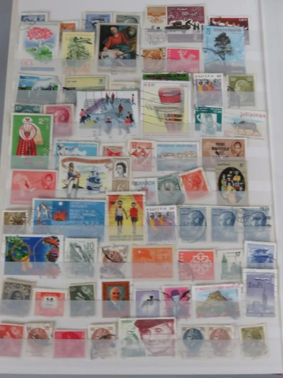 Postzegelverzameling in album met Belgische en vele andere postzegels