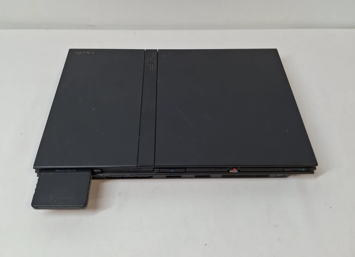 PlayStation 2 console met 2 spellen en toebehoren - foto 2