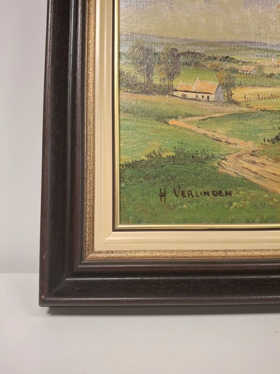 Schilderij H. Verlinden met landschap en boerderijen in houten lijst