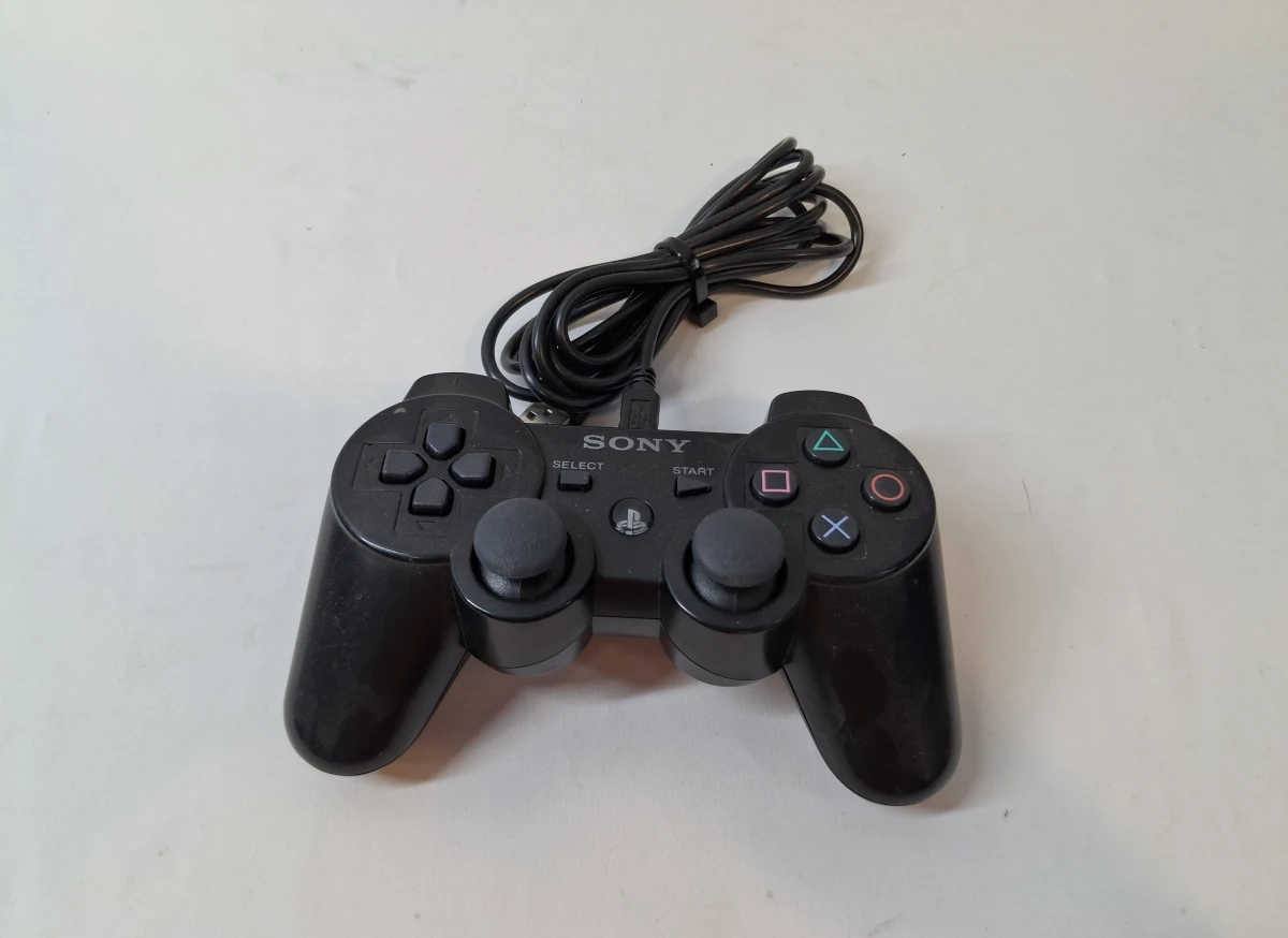 PlayStation 3 console met controller en 2 spellen - foto 9