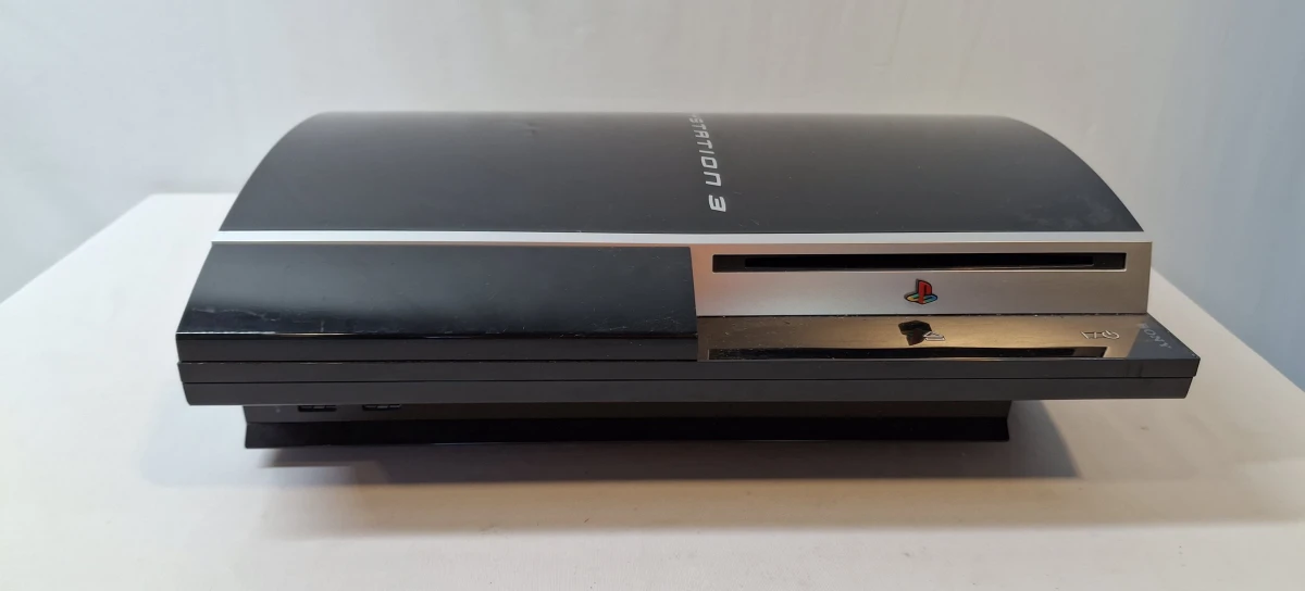 PlayStation 3 console met controller en 2 spellen - foto 3