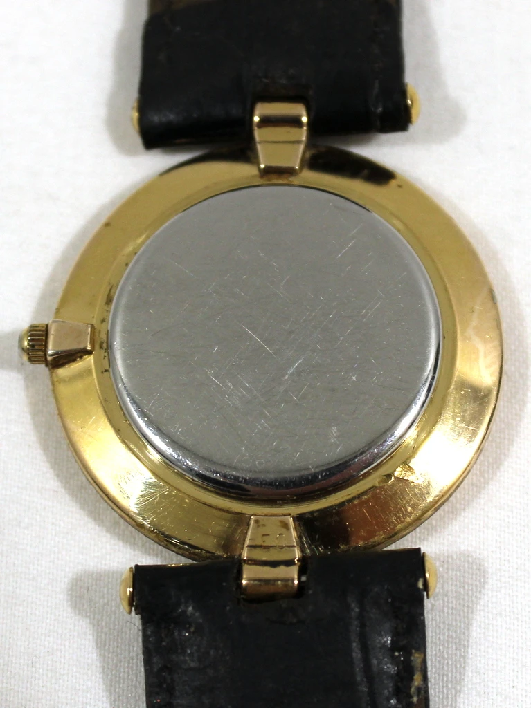 Vergulde Delma Horloge