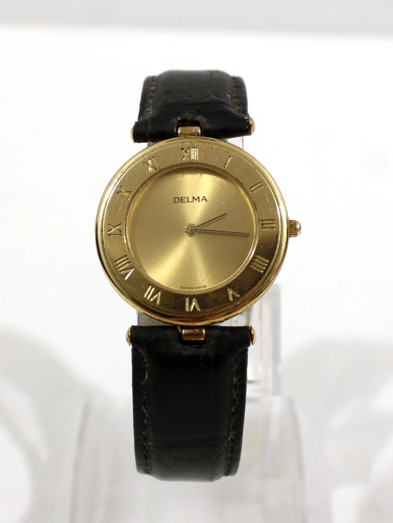 Vergulde Delma Horloge