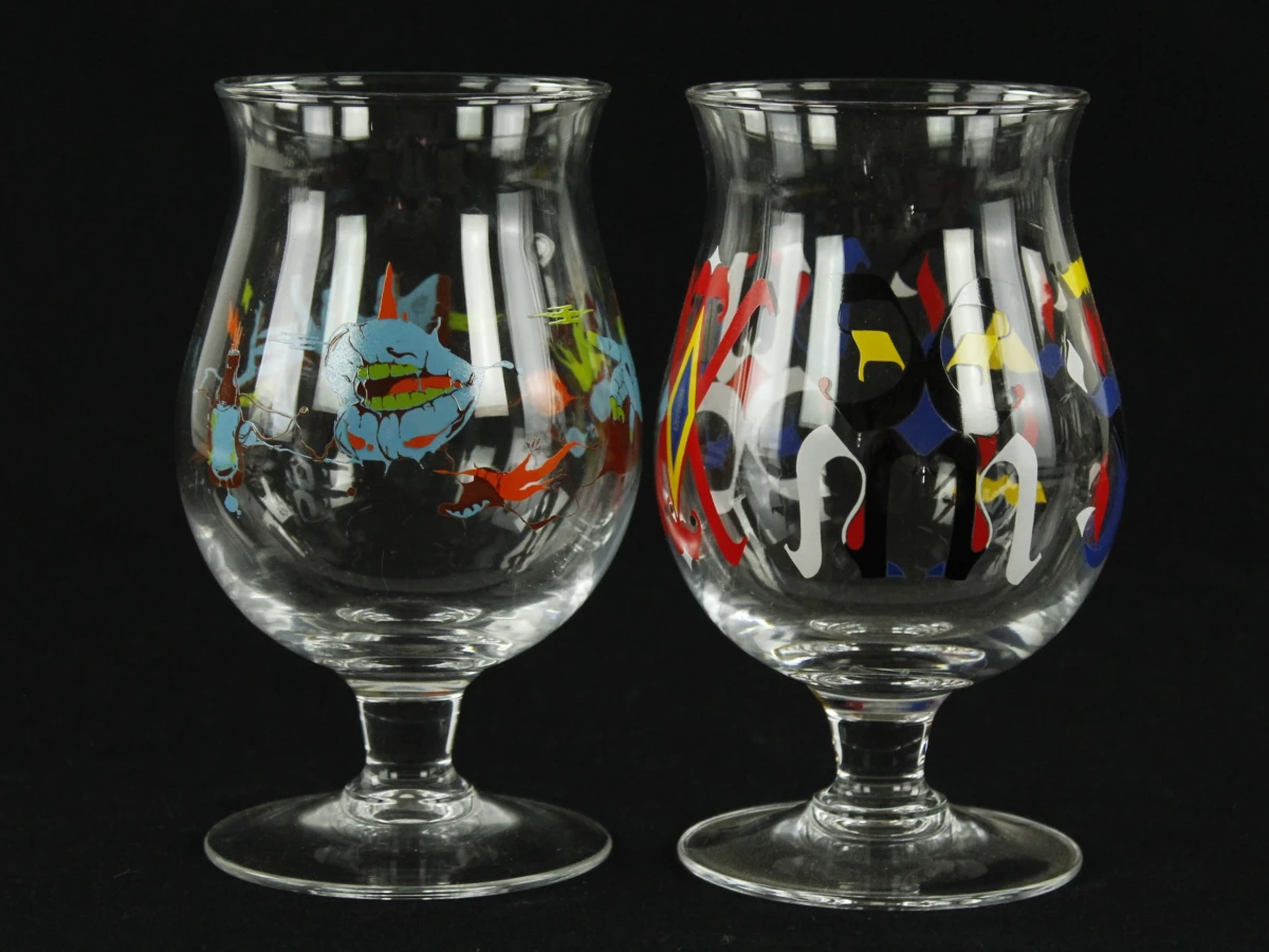 Lot van 7 Duvel Art en Limited editon uitgaven glazen  met accessoires