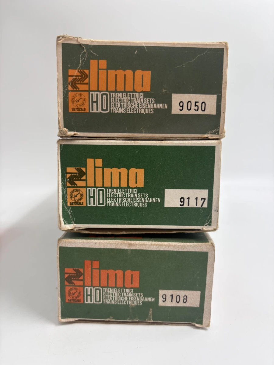 Set vintage HO modeltreinwagons en autotransportwagon