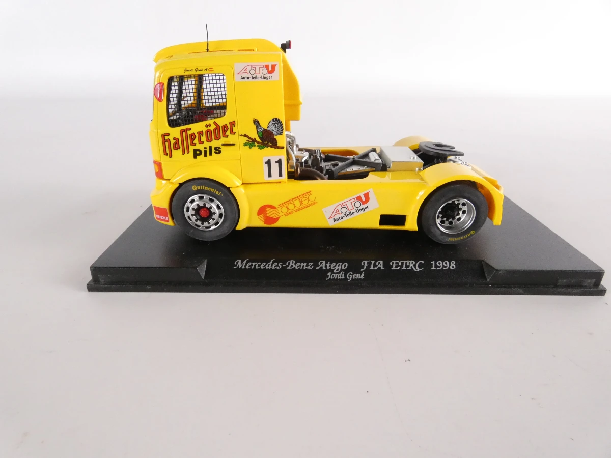 Set van 4 schaalmodellen vrachtwagens in displayboxen