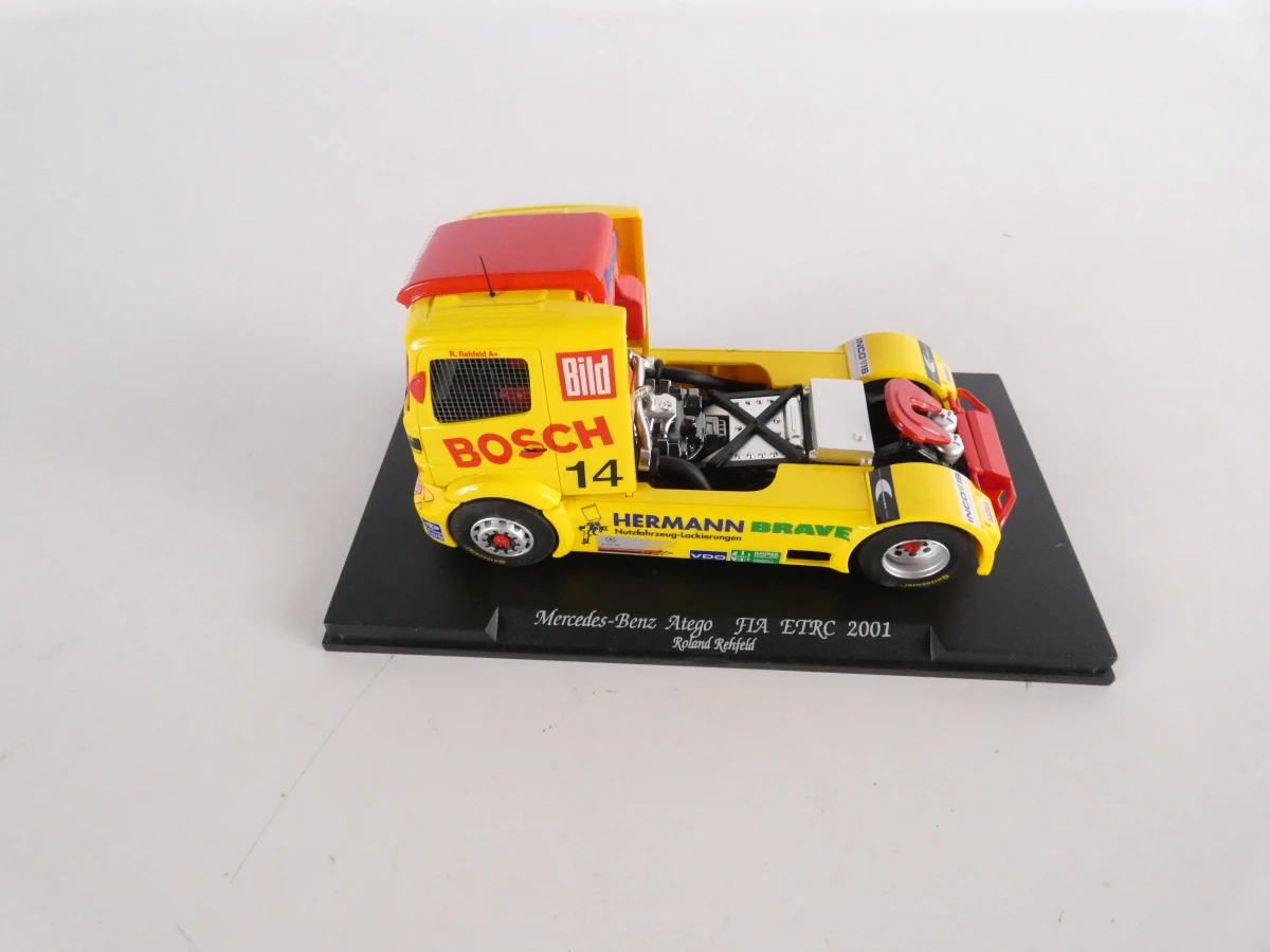 Set van 4 schaalmodellen vrachtwagens in displayboxen