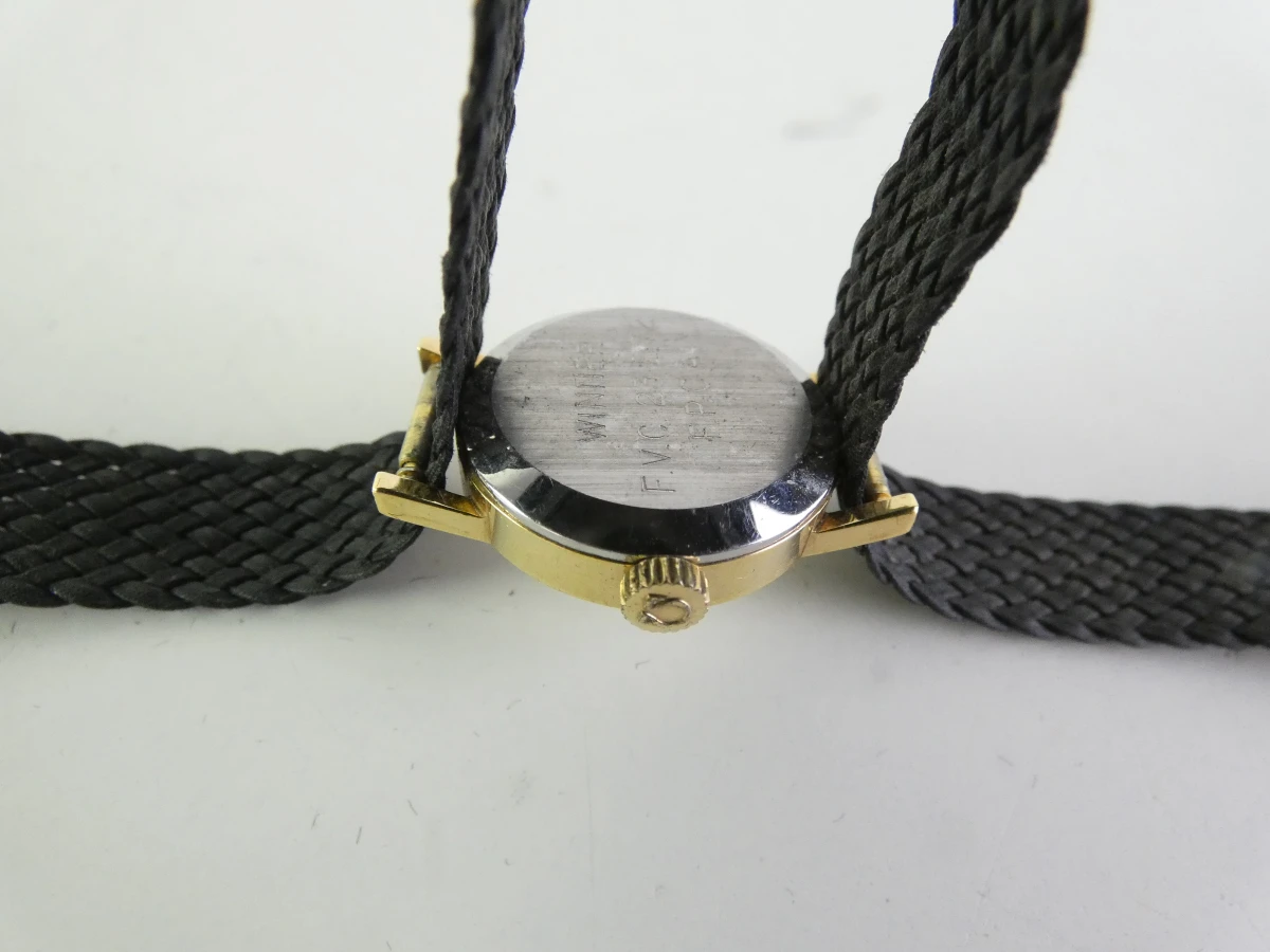 Omega Dameshorloge met gevlochten band