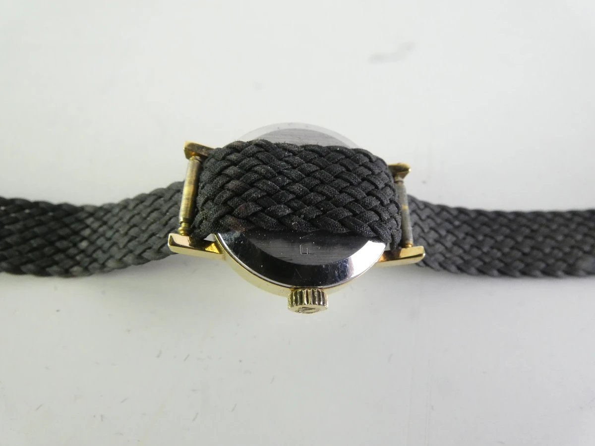 Omega Dameshorloge met gevlochten band