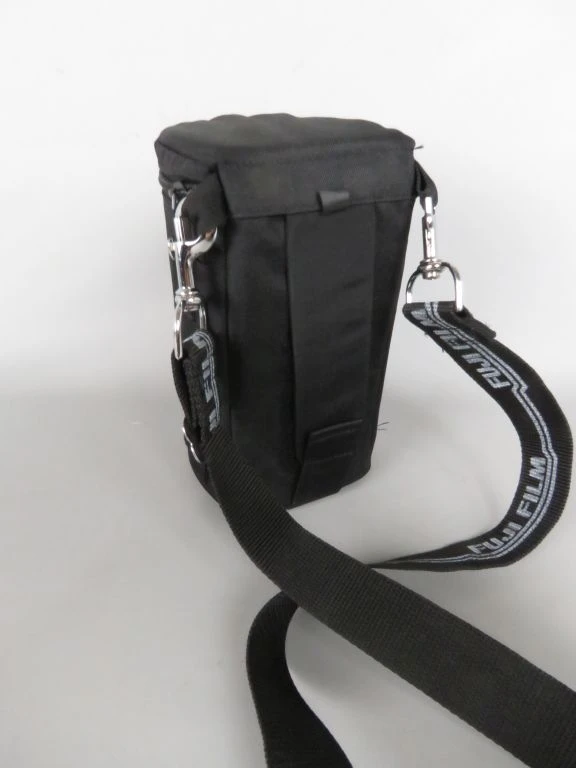 Zwarte Lowepro lenshoes met draagriem