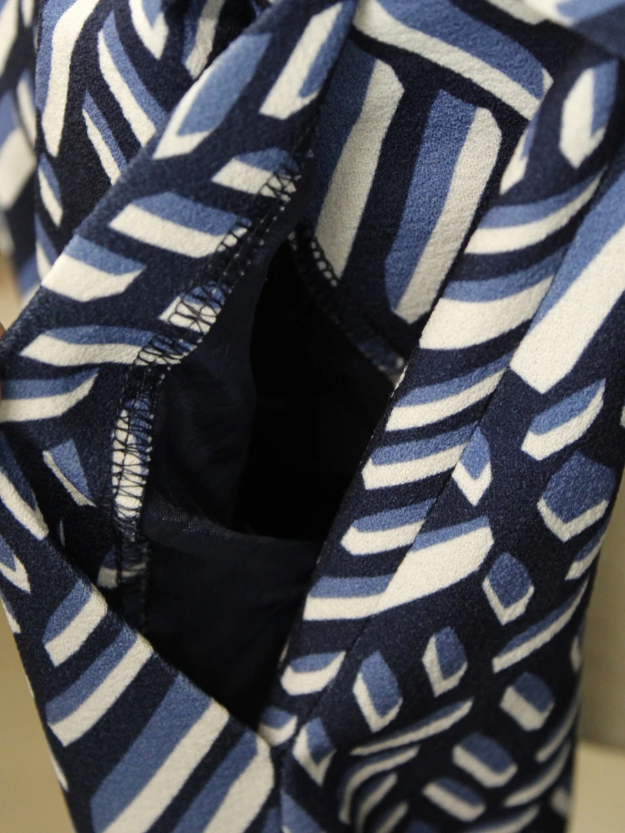 Caroline Biss – elegante wijde pantalon met grafische print en ceintuur