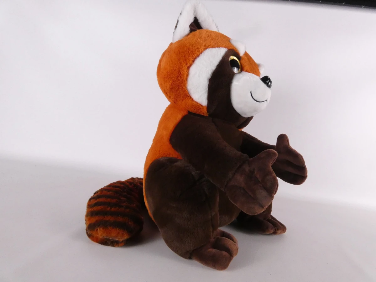 Grote bruine en cognackleurige wasbeer-knuffel