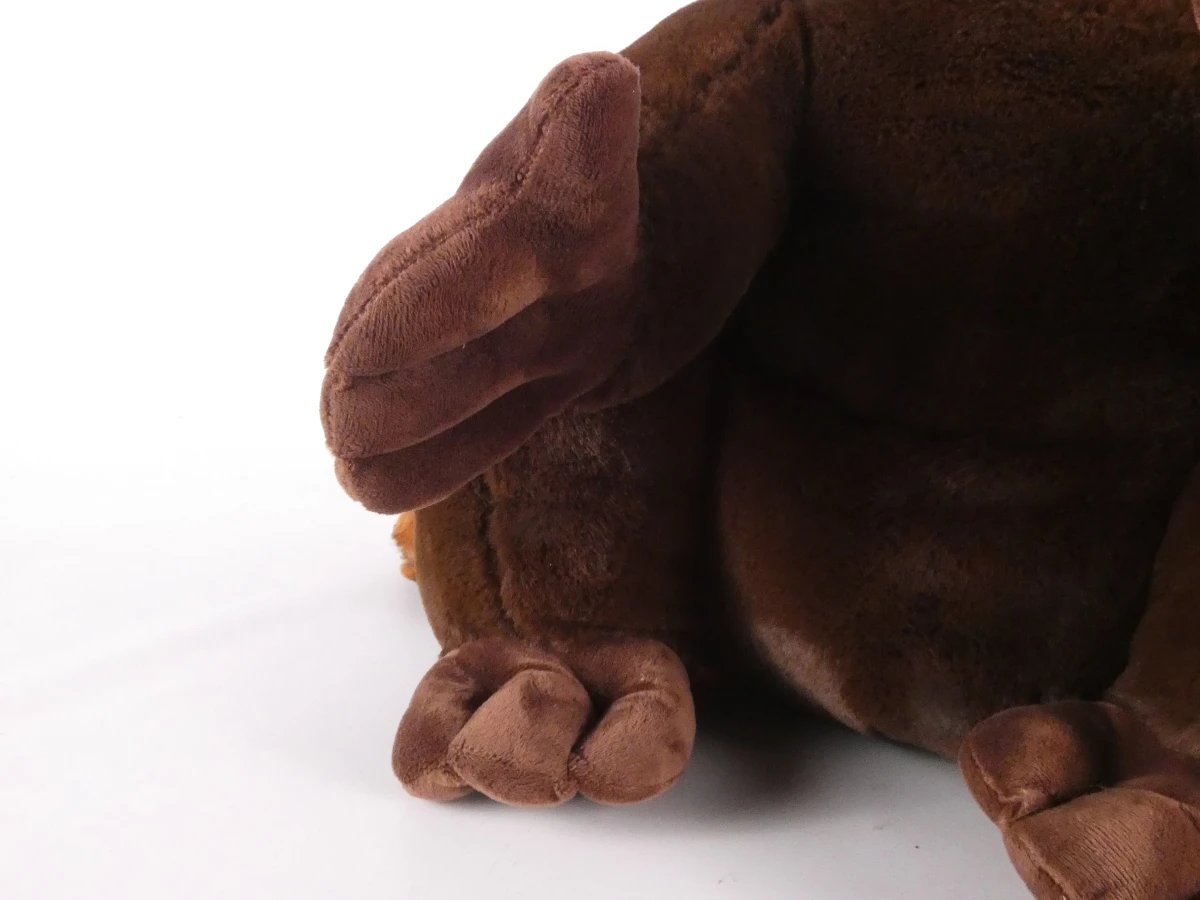 Grote bruine en cognackleurige wasbeer-knuffel