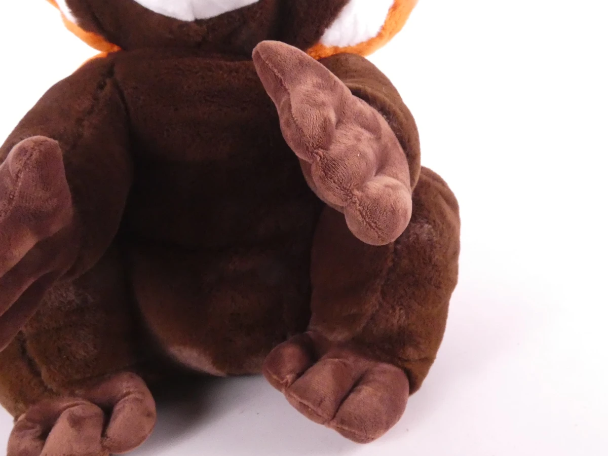 Grote bruine en cognackleurige wasbeer-knuffel