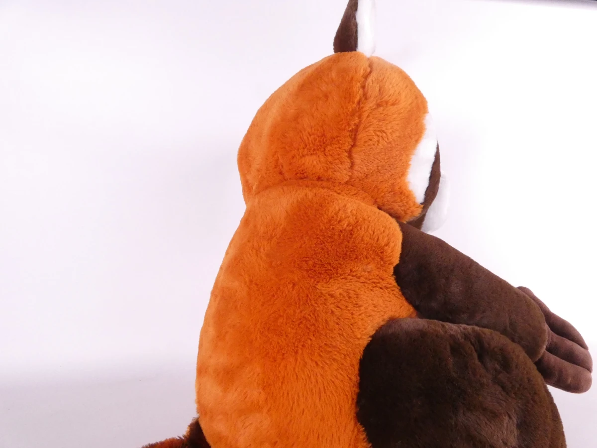 Grote bruine en cognackleurige wasbeer-knuffel