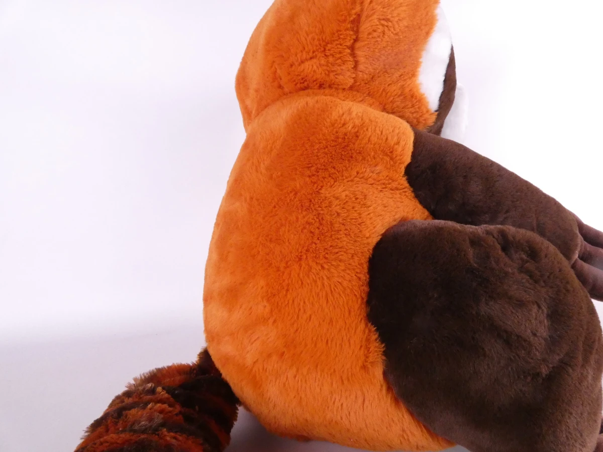 Grote bruine en cognackleurige wasbeer-knuffel