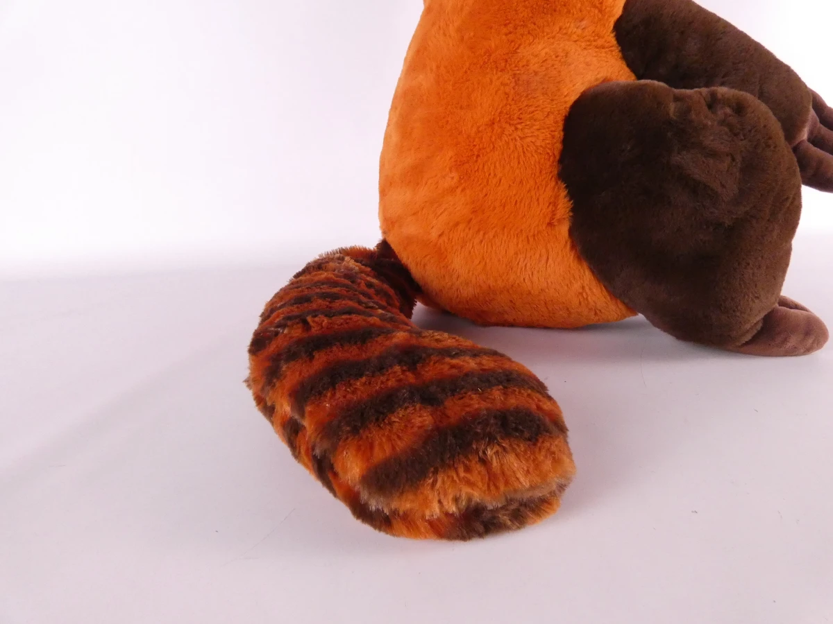 Grote bruine en cognackleurige wasbeer-knuffel