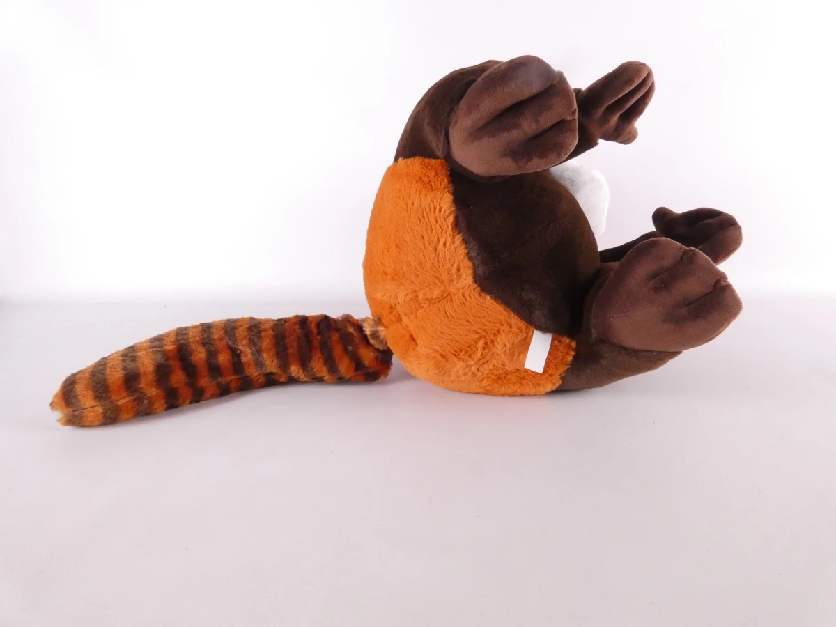 Grote bruine en cognackleurige wasbeer-knuffel