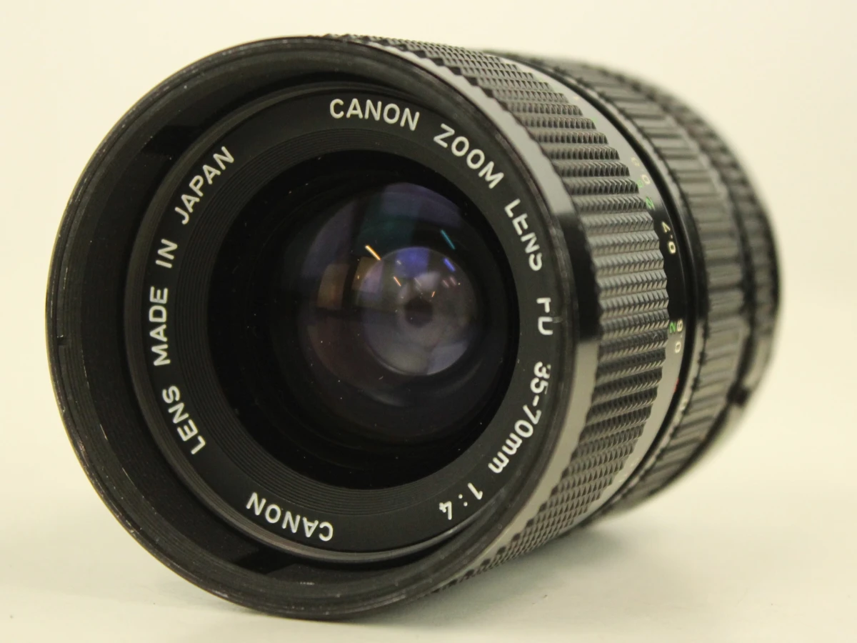 Canon AE-1 spiegelreflexcamera met 2 zoomlenzen en tas