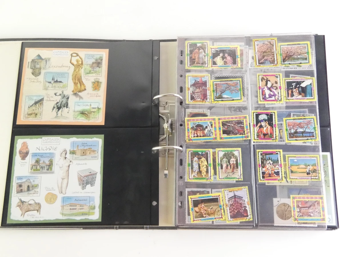 Verzameling postzegels met albums en losse vellen