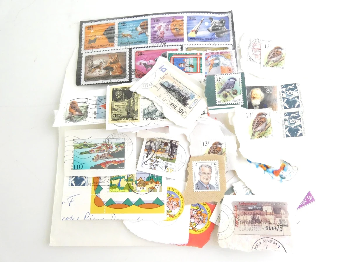 Verzameling postzegels met albums en losse vellen