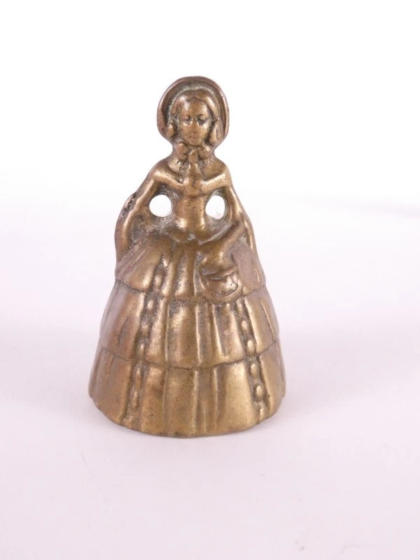 7 vintage figuratieve belletjes in messing/koper