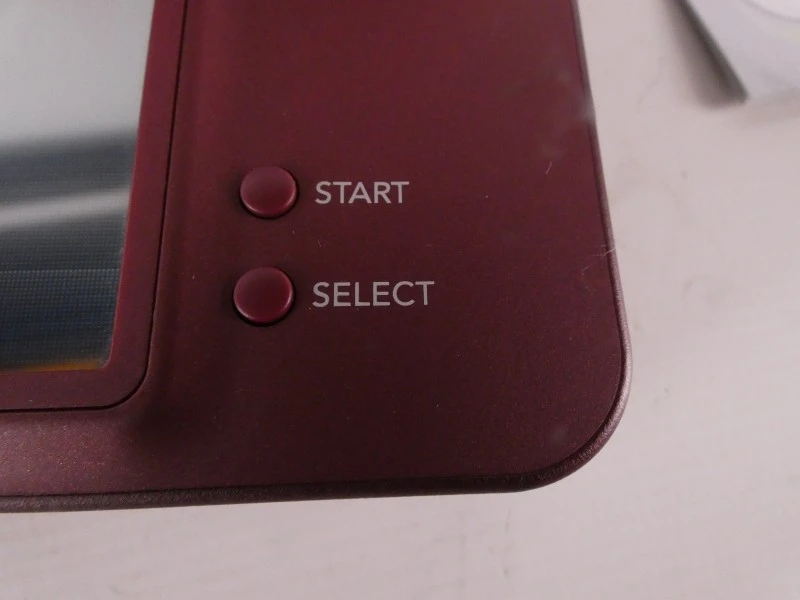 Nintendo DSi XL in doos met Brain Training spel
