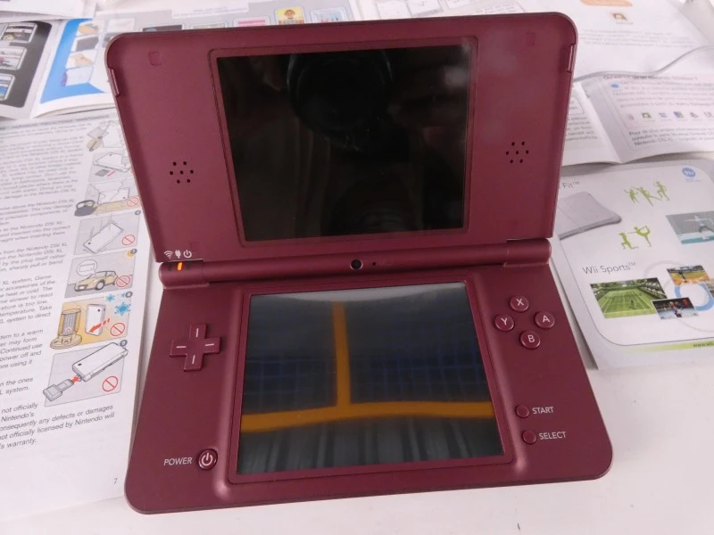 Nintendo DSi XL in doos met Brain Training spel