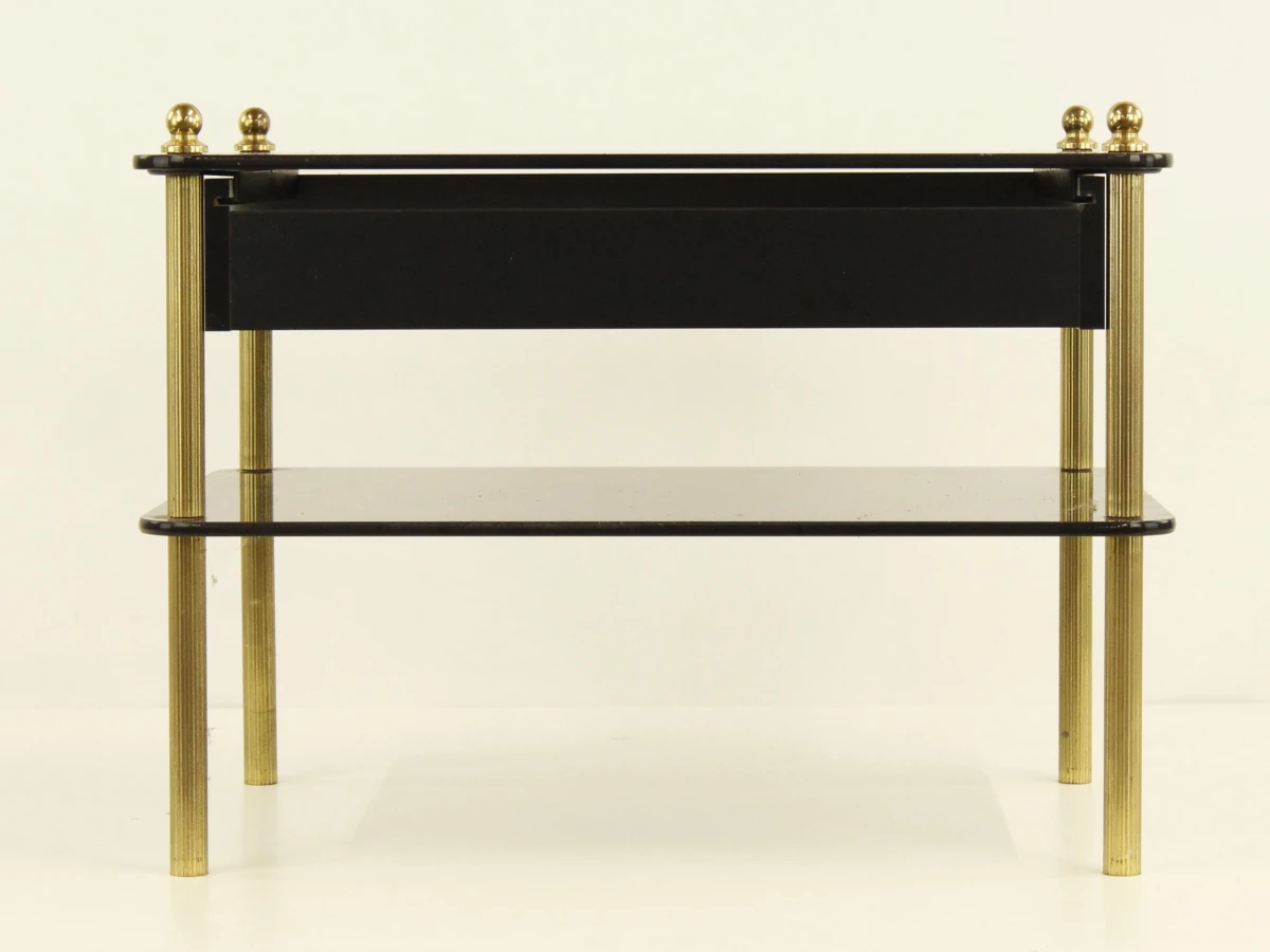 Zwart glazen salontafel met lade en messing poten