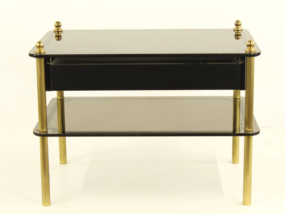 Zwart glazen salontafel met lade en messing poten