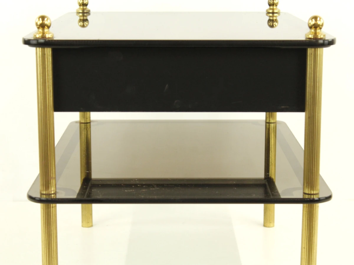 Zwart glazen salontafel met lade en messing poten