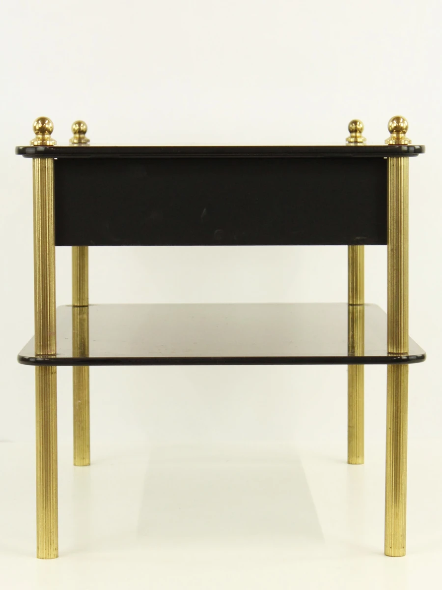 Zwart glazen salontafel met lade en messing poten