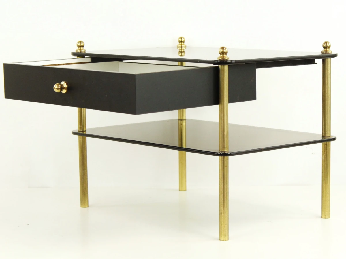Zwart glazen salontafel met lade en messing poten