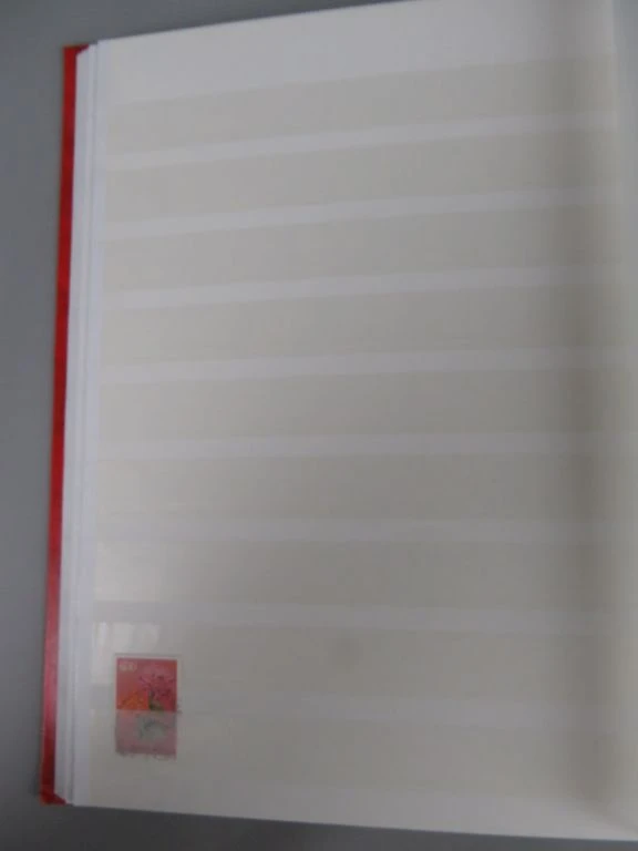 Postzegelverzameling Jugoslavija en Polen in album