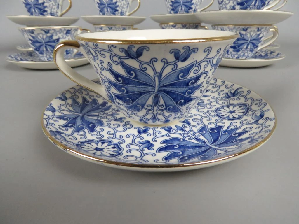Blauw-wit porseleinen koffieservies met gouden accenten