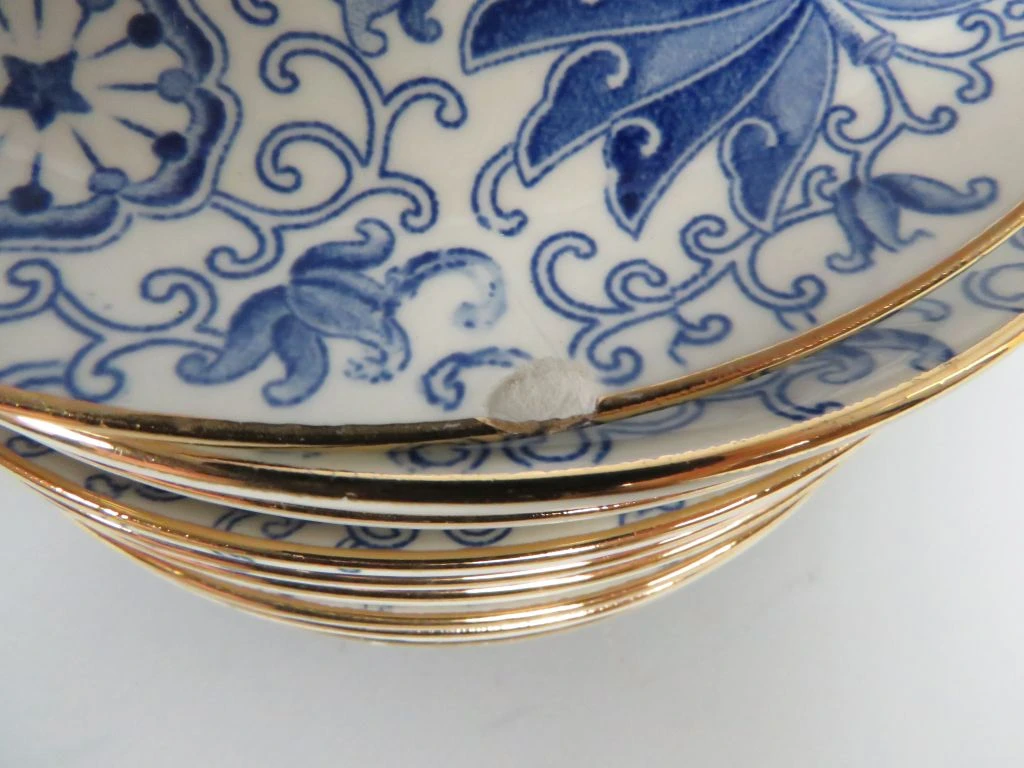 Blauw-wit porseleinen koffieservies met gouden accenten