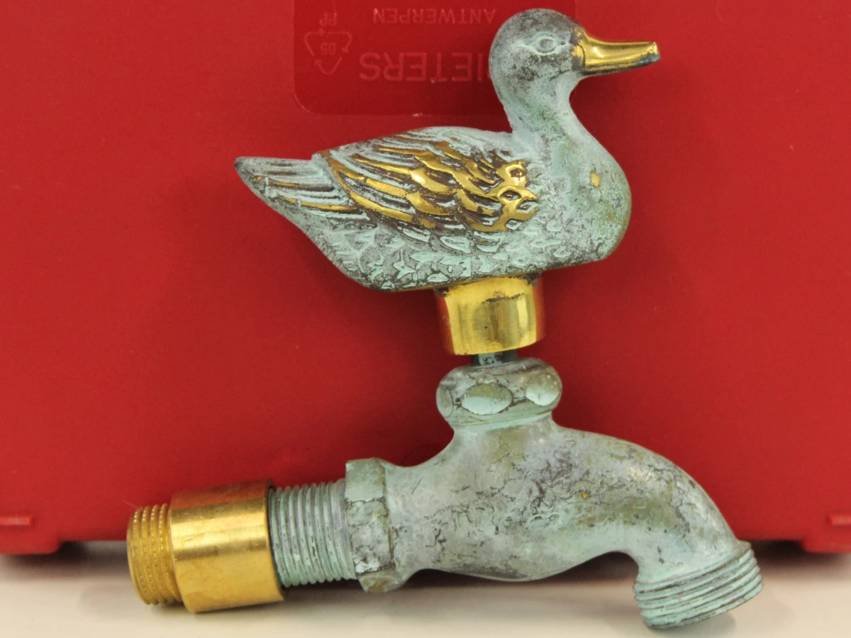 Set van 2 vintage tuinkranen in messing  met vogelmotief
