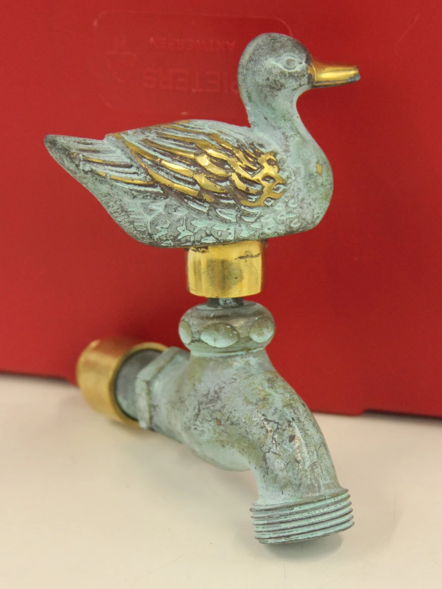 Set van 2 vintage tuinkranen in messing  met vogelmotief