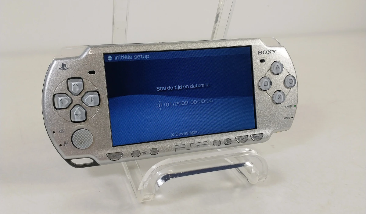 Sony PlayStation Portable (PSP) zilver met oplader, draagtas en 4 UMD-games - foto 10