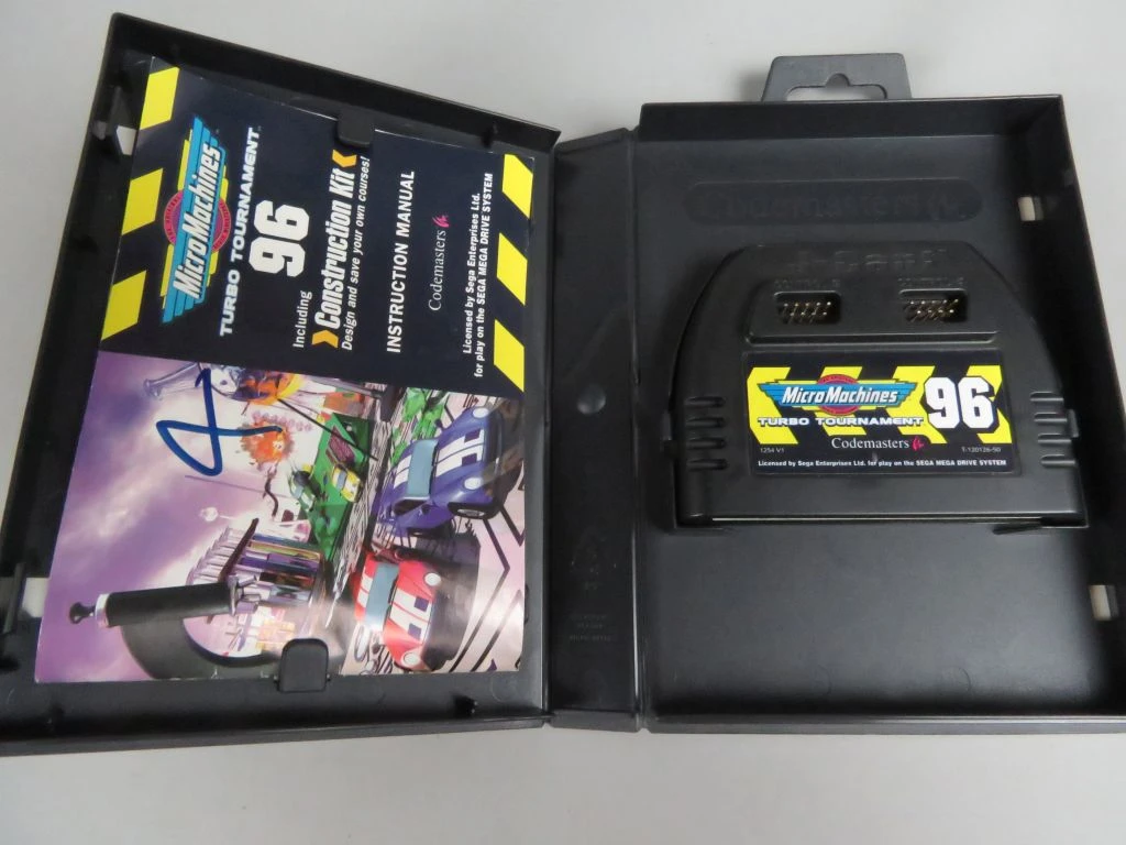 Set retro gamecontrollers met Sega console en spelletjes - foto 9