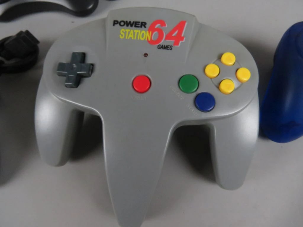 Set retro gamecontrollers met Sega console en spelletjes - foto 14