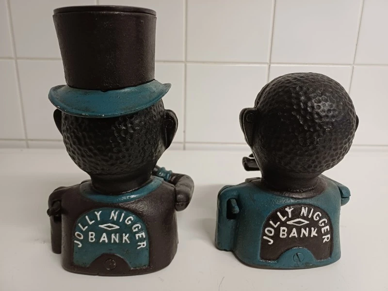 Set van 2 vintage gietijzeren mechanische Jolly Bank spaarpotten