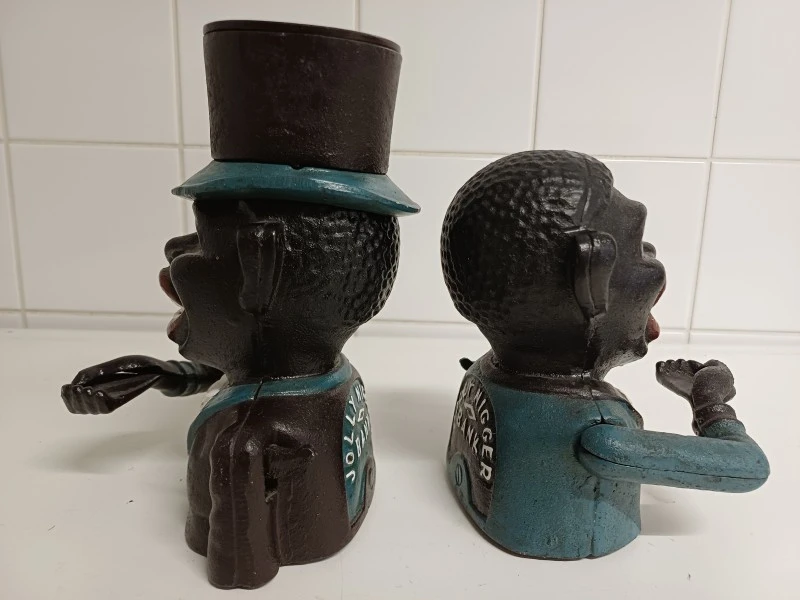 Set van 2 vintage gietijzeren mechanische Jolly Bank spaarpotten