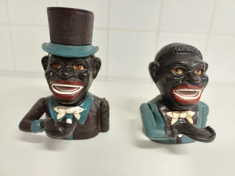 Set van 2 vintage gietijzeren mechanische Jolly Bank spaarpotten