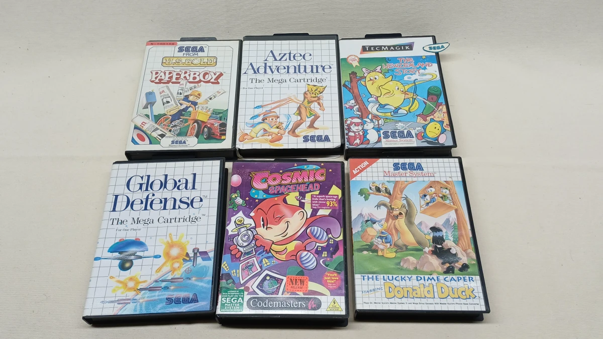 Set van 12 Sega Master System spellen met handleidingen - foto 4