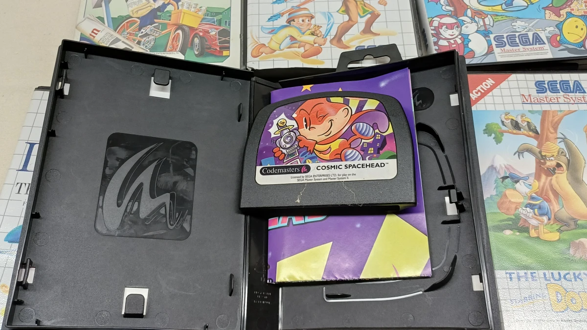 Set van 12 Sega Master System spellen met handleidingen - foto 5